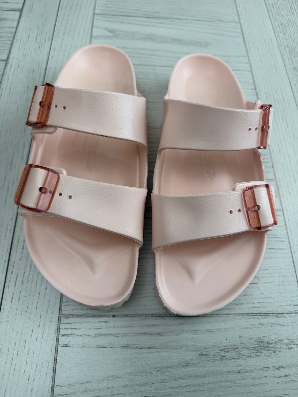 Birkenstock Two-Strap Slide Sandals in Pale Pink with Rose Buckles